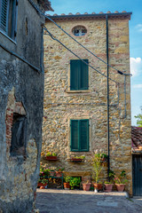 Colorful narrow streets in the medieval town of Guardistallo in Tuscany - 4