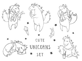 Vector set of hand drawn cute unicorns on withe background. Cartoon style. Monochrome.
