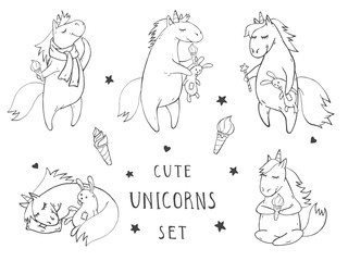 Vector set of hand drawn cute unicorns on withe background. Cartoon style. Monochrome.