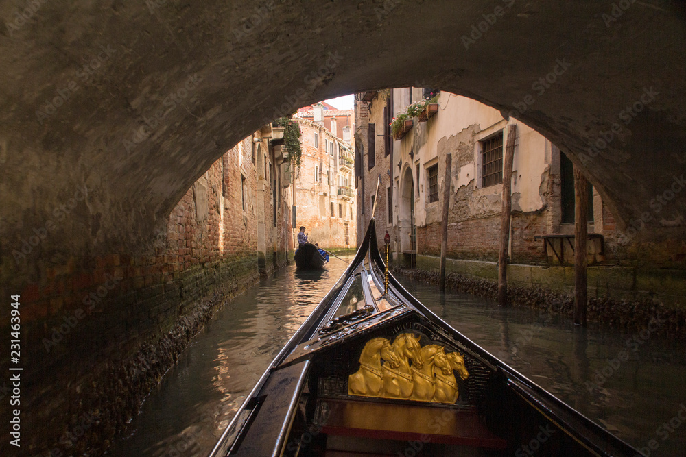 Wall mural view from a gondola in venice backstreet