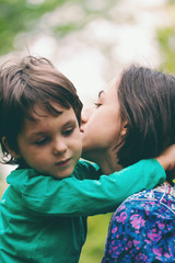 Fototapeta premium The boy is hugging his mother.