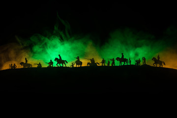American Civil War Concept. Military silhouettes fighting scene on war fog sky background. Attack...
