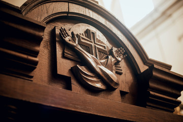 Wooden window of confessional box at church - obrazy, fototapety, plakaty