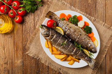 Grilled whole trout. Served with baked potatoes.