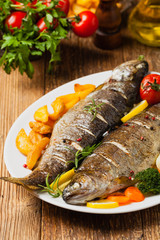 Grilled whole trout. Served with baked potatoes.
