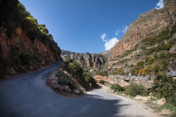 Cycling mountain road. Misty mountain road in high mountains.. Cloudy sky with mountain road. Summertime