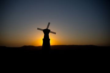 Traditional, Dutch windmill at a hill during a summer sunset. Decoration.