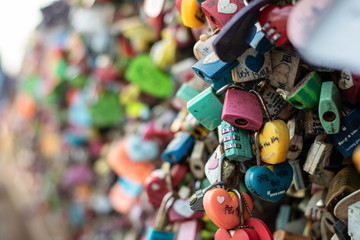 areity of locked key at N Seoul tower on the Namsan mountain that people believe they will have the forever love if write the couple name on it