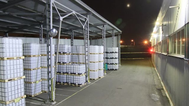 timelapse loaders fill trucks at bulk containers ramp
