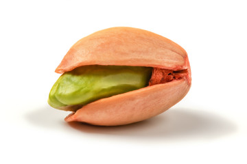 Single pistachio shell, with peeled green shell inside, isolated on white background.