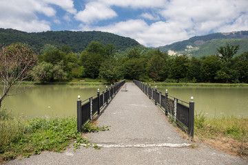 Landscape with misty morning fog in the Forest Lake or Beautiful forest lake in the morning at winter time. Azerbaijan nature. Caucasus.