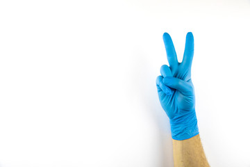 Male hand in medical glove on white background.