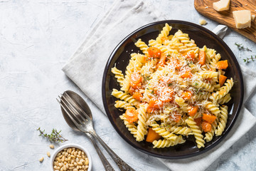 Pumpkin pasta with thyme, cream sauce and parmesan.