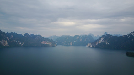 Aerial Khao Sok National Park with jungle and Clouds