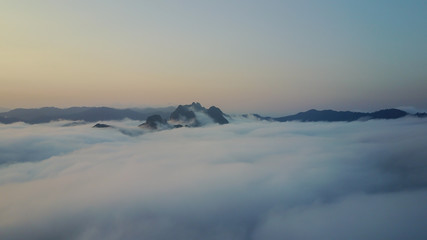 Aerial Khao Sok National Park with jungle and Clouds