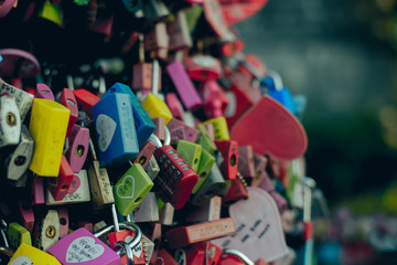 areity of locked key at N Seoul tower on the Namsan mountain that people believe they will have the forever love if write the couple name on it