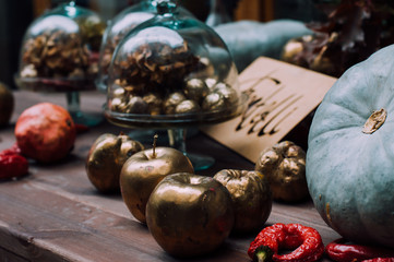 Traditional decor for restaurants during Halloween and Thanksgiving holidays. A colorful pumpkin patch, fruits and vegetables are gifts of autumn.