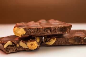 Chocolate pieces on white background