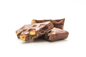 Chocolate pieces on white background