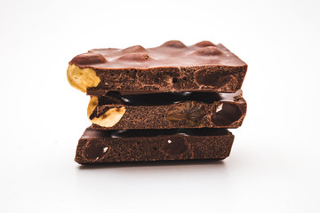 Chocolate pieces on white background
