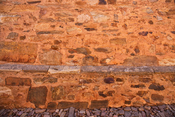 muro de piedra y roca antiguo de color naranja