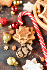 christmas cookies in the shape of stars decor gold, with candy,  pine cones, and  Christmas balls yellow and red, Christmas 2019, new year is 2019, selective focus