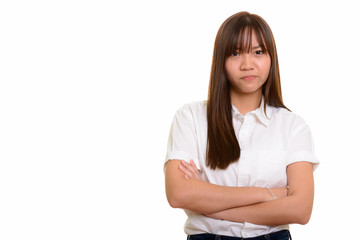 Young cute Asian teenage girl looking angry