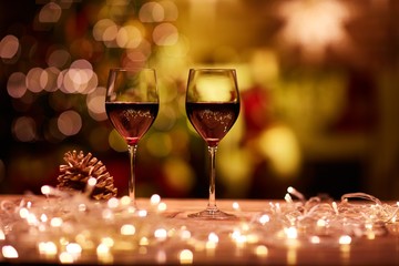 Christmas still life with glasses of red wine