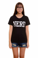 Fototapeta premium Portrait of young cute Asian nerd teenage girl