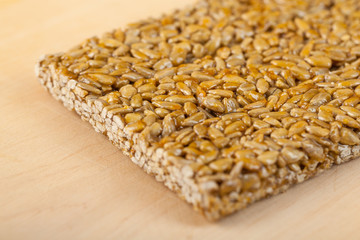 gozinaki from sunflower seeds on the Wooden board