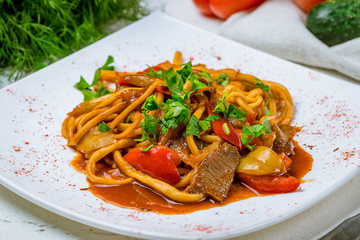 fried lagman on plate