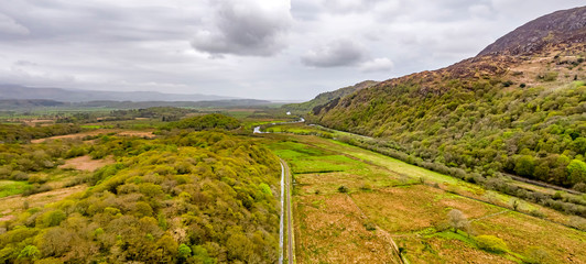 Fototapeta premium Aerial view of railway track in Snowdonia National Park in Wales - United Kingdom