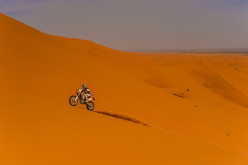 Rider on a dune in Erg Chebbi, Merzouga, Morocco