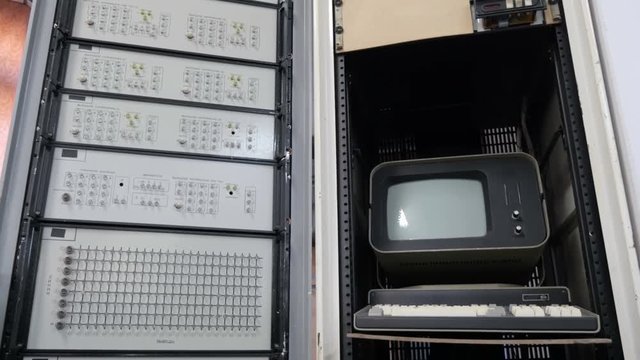 Retro computer. Old electronic dials and buttons computer technology
