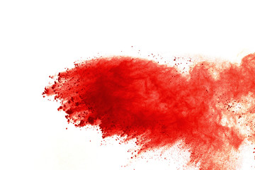 Red powder explosion on white background. Paint Holi.