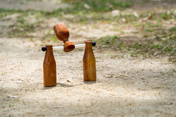 brown woodball gate or finish line on sand ground floor.