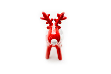 Red Rudolph dear with big antlers. Christmas and holiday concept. Isolated object on a white...