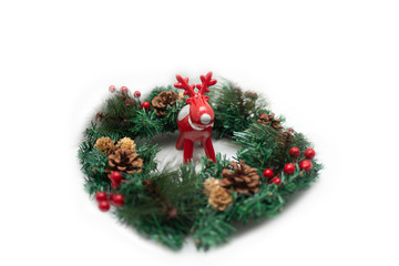 Red Rudolph dear with big antlers. Christmas and holiday concept. Isolated object on a white background.