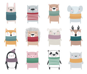Vector collection of line drawing cute winter animals in cozy clothes