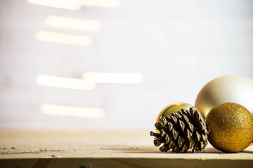 decorative pine cones with gold christmas balls decoration Christmas background texture