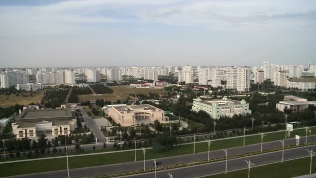 The city of Ashgabat. Residential areas of the city with the road adjacent to it in Turkmenistan