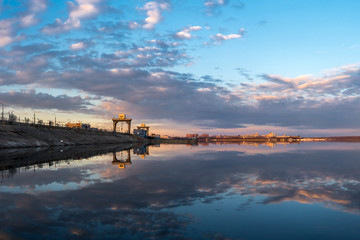 Naklejka na ściany i meble View of the hydroelectric station dam on the Angara River in Irkutsk