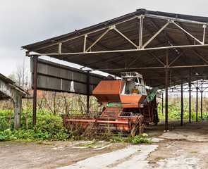 Old agricultural machinery. .Abandoned collective farm. Russia, Tula region.