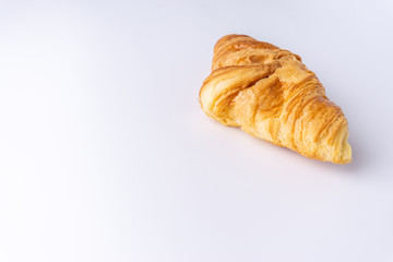 Plain croissant on white background