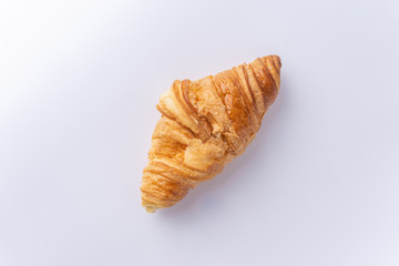 Plain croissant on white background