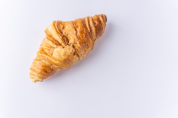 Plain croissant on white background