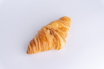 Plain croissant on white background