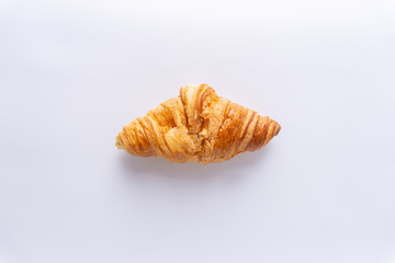 Plain croissant on white background