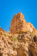 Fototapeta premium Arizona desert wilderness sheer rocky cliffs surround a man made lake in Arizona's wilderness area