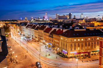 The Krakowskie Przedmiescie street in the Old Town of Warsaw. it is one of the central historic streets of Warsaw seen from above at night.